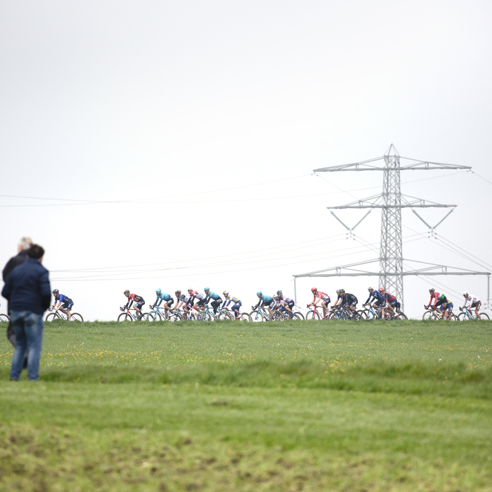 Amstel Gold Race 2023 - Fans watch the peloton on Schaapdries with a pylon in the background