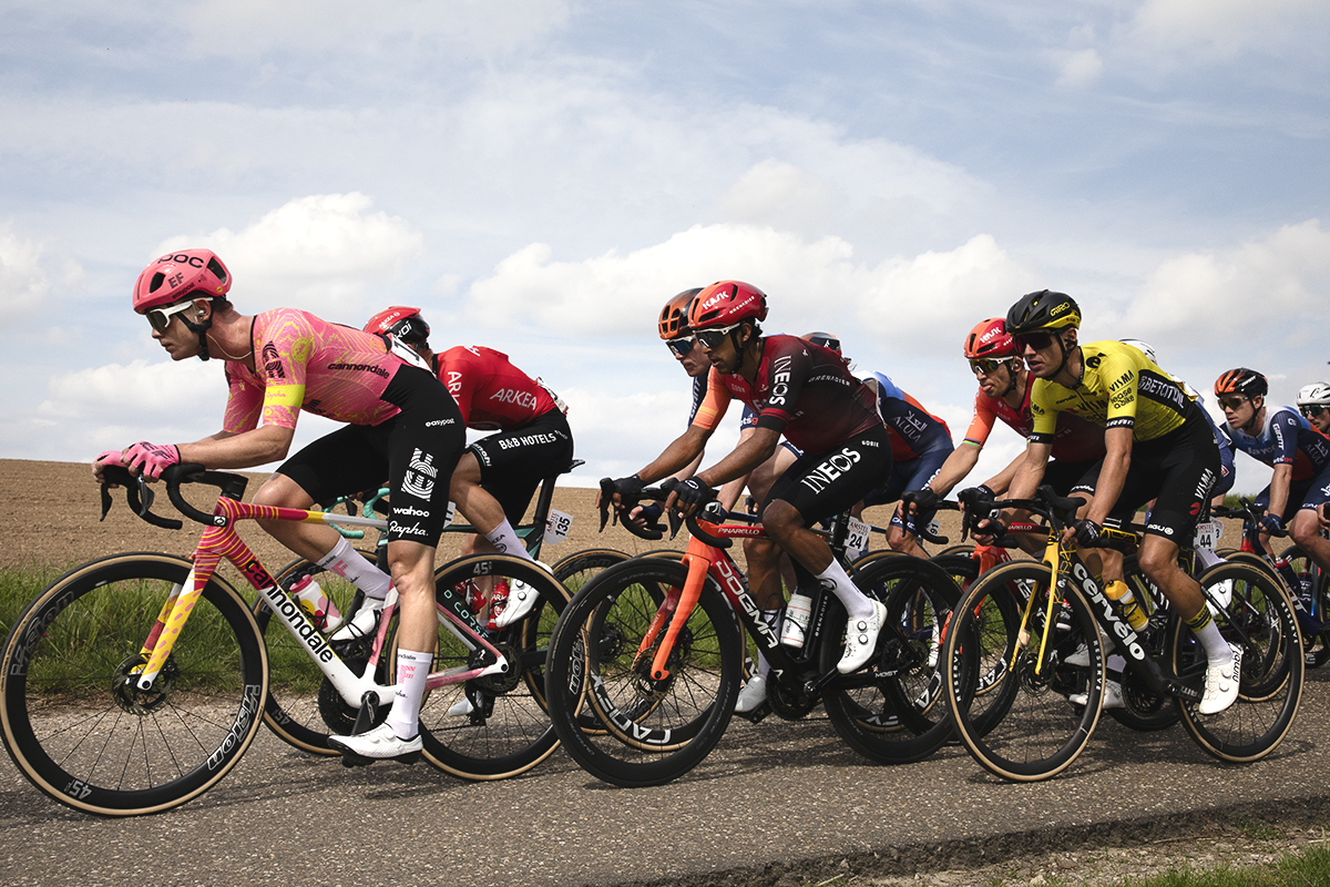 Amstel Gold Race 2024 - Marijn van den Berg of EF Education - EasyPost rides with a group of others past open fields on the Heugdenweg