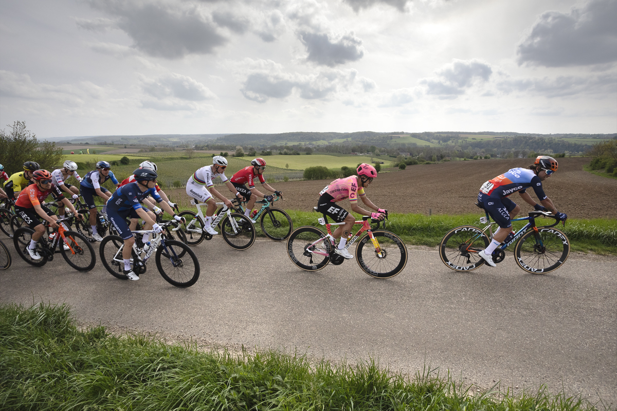 Amstel Gold Race 2024 - A group of favourites ride past the open views of Schaapsdries