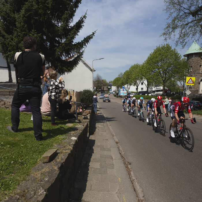 Amstel Gold Race 2025 - Spectators watch the race from their garden vantage point in Epen