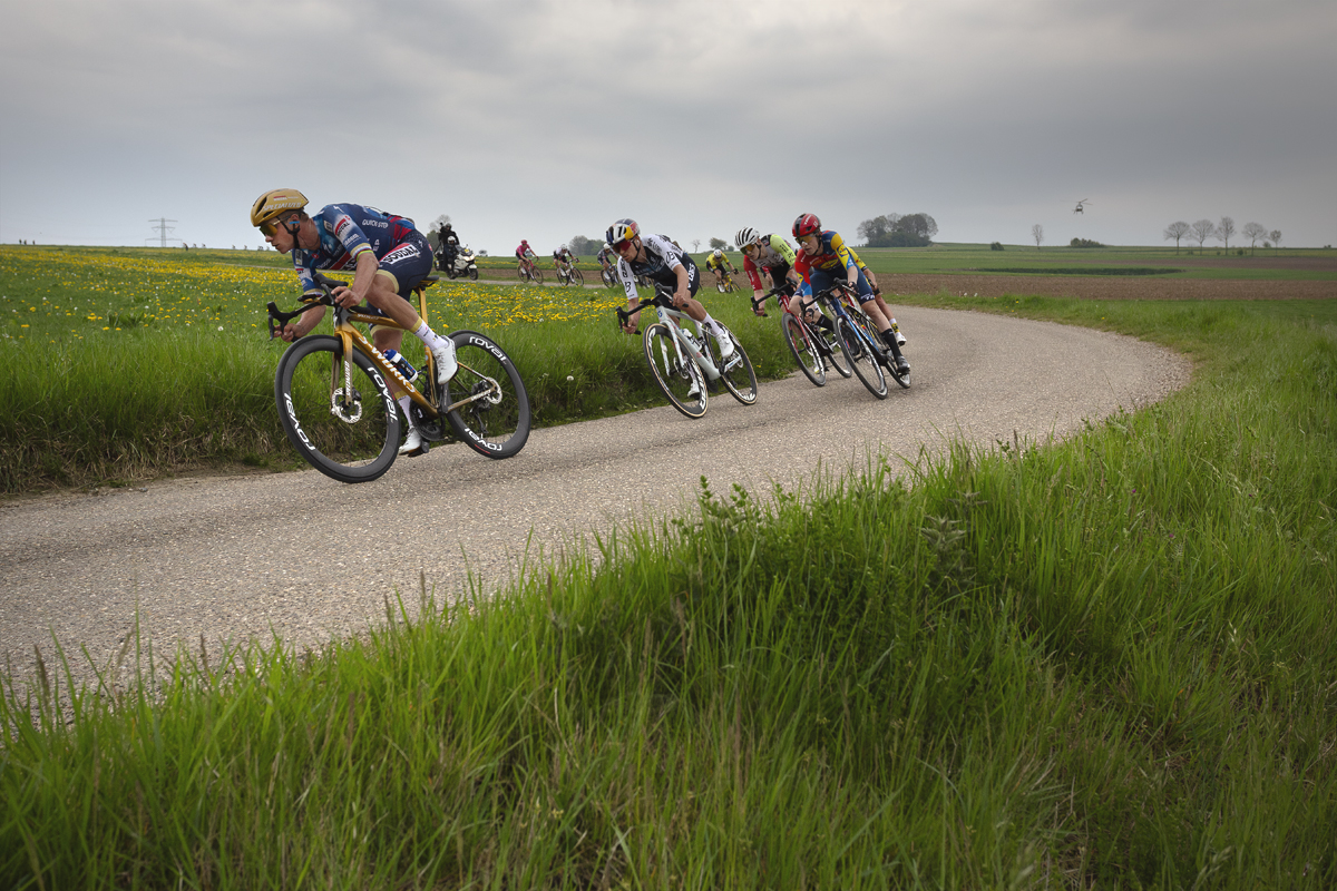 Amstel Gold Race 2025 - Remco Evenepoel & Tom Pidcock bank round a corner during their pursuit of Tadej Pogačar