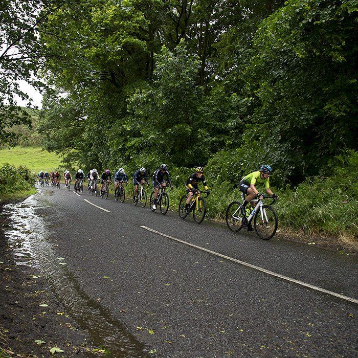 British National Road Championships 2022 - Women’s Road Race - A Strung out peloton ascend a hill