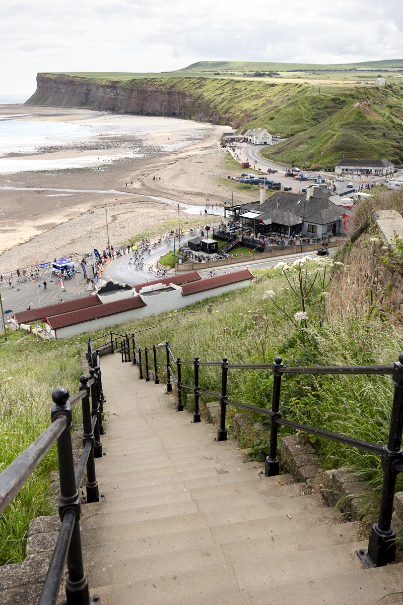 British National Road Championships 2024 - Women’s Road Race - The race passes down the sea front as seen from the top of steep steps