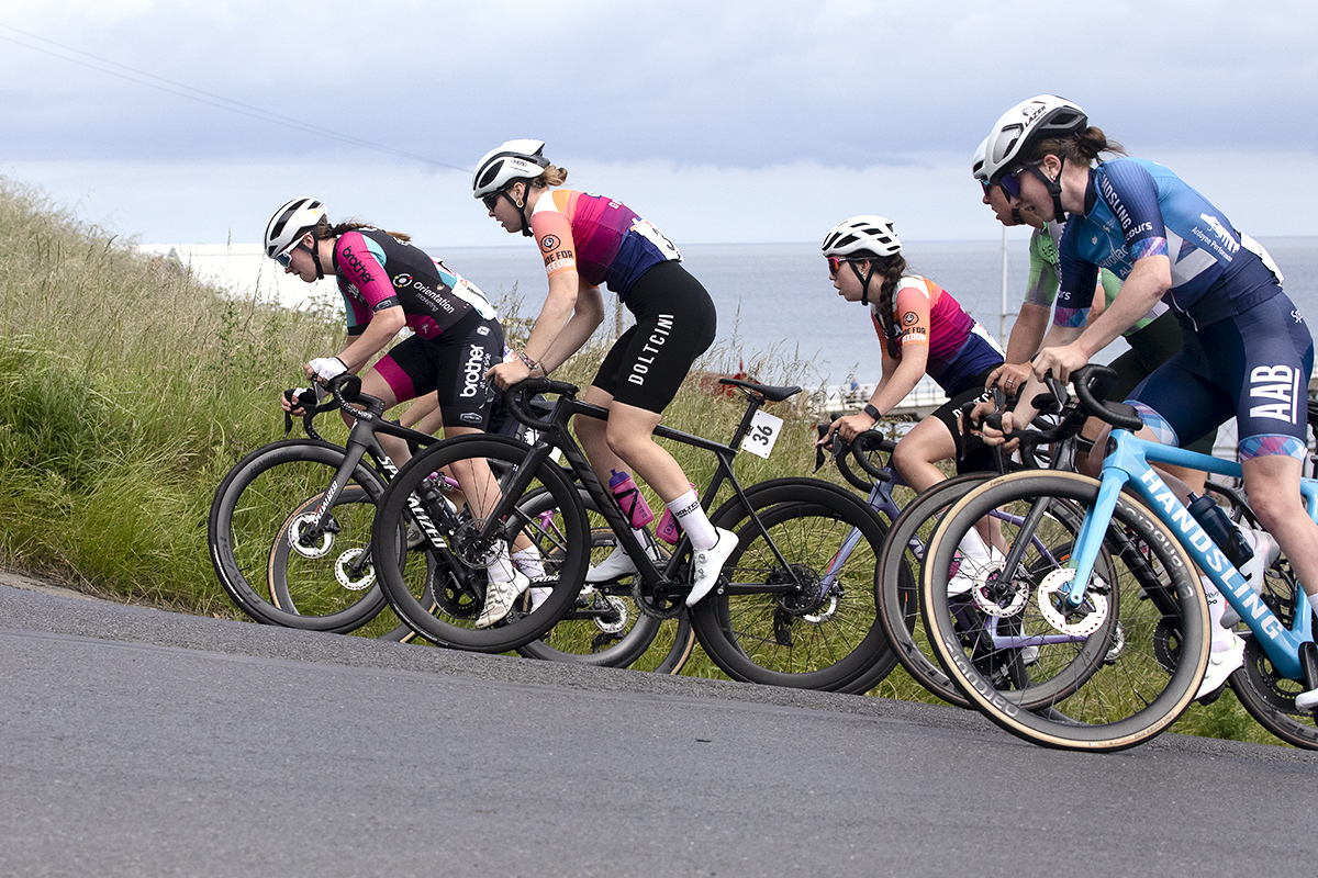 British National Road Championships 2024 - Women’s Road Race - A group of riders led by the Doltcini O’Shea team make their way up the climb at Saltburn