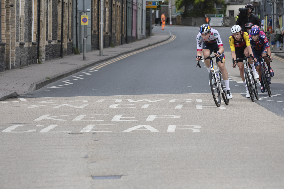 British National Road Championships 2025 - Road Race - Men - riders race through the streets of Aberystwyth