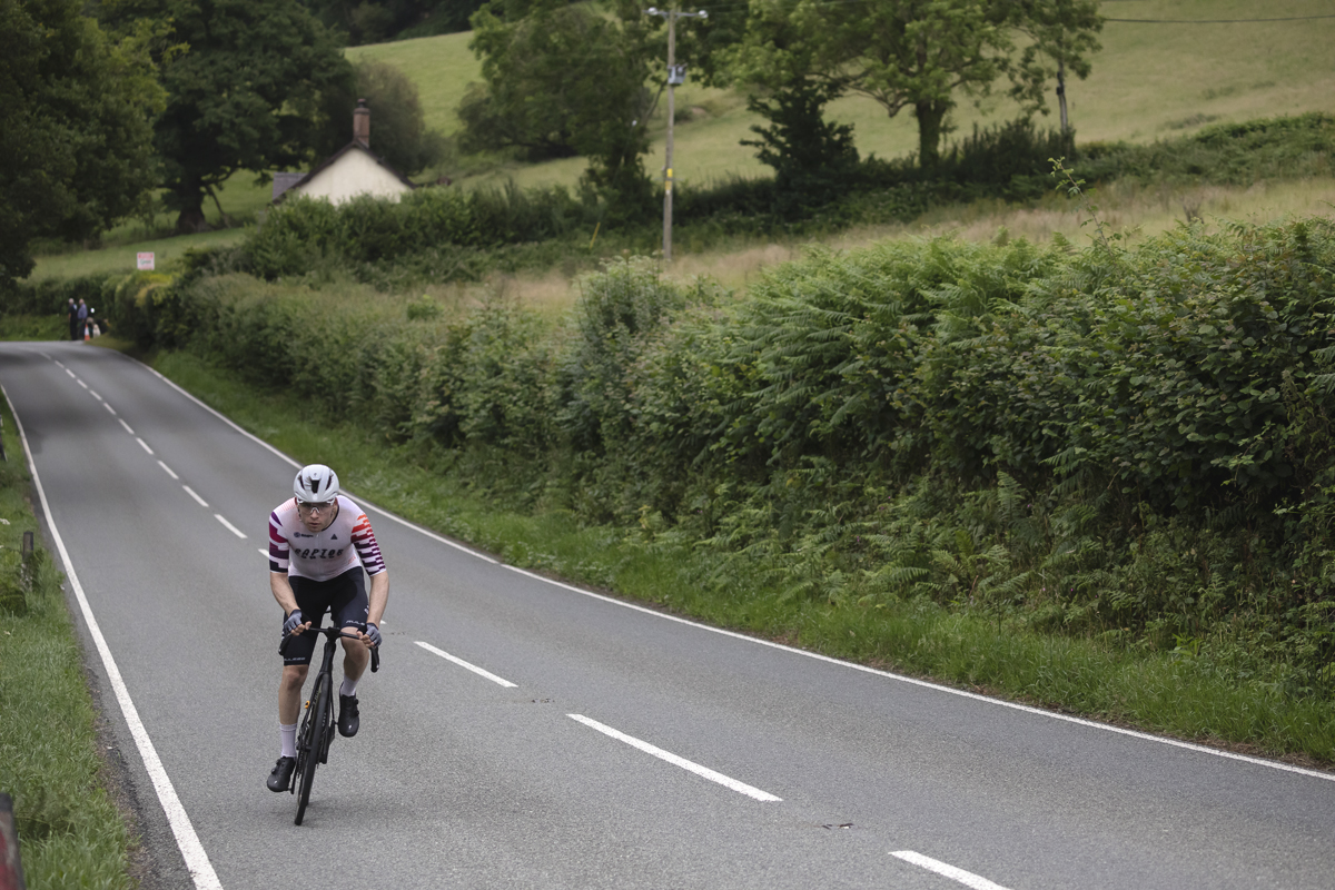 British National Road Championships 2025 - Road Race - Men - Alex Franks of Raptor Factory Racing pushes on through the Welsh countryside