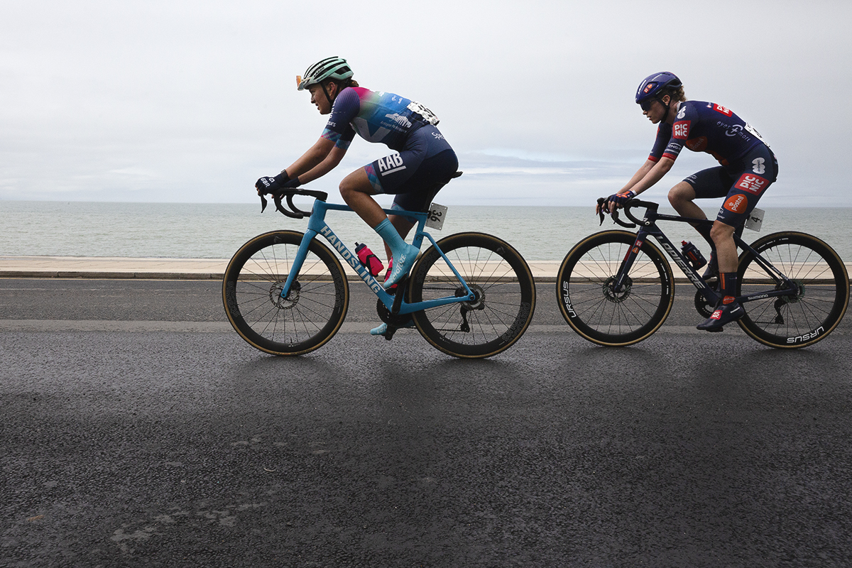 British National Road Championships 2025 - Road Race - Women - Becky Storrie of Team Picnic PostNL & Madelaine Leech of Handsling Alba Development Road Team ride along the seafront with the sea in the background