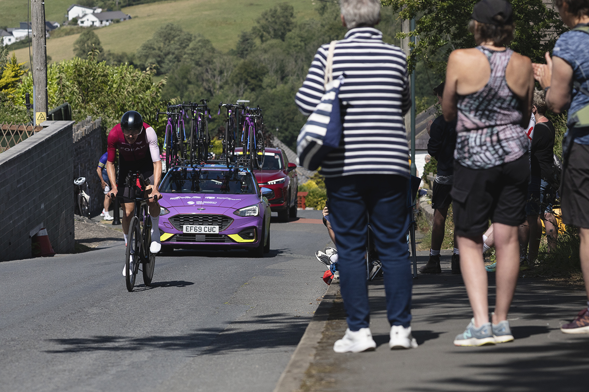British National Road Championships 2025 - Time Trial - Elite Men - Dom Jackson of Foran CT cycles up a steep hill watched on by fans