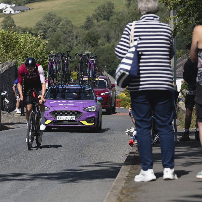 British National Road Championships 2025 - Time Trial - Elite Men - Dom Jackson of Foran CT cycles up a steep hill watched on by fans