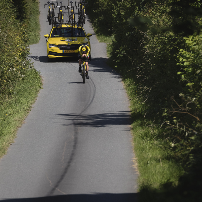 British National Road Championships 2025 - Time Trial - Elite Men - Matthew Brennan of Team Visma - Lease a Bike is followed by his team car as he races through the Welsh lanes