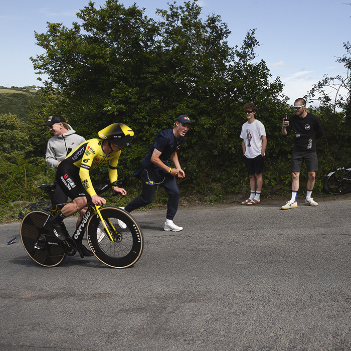 British National Road Championships 2025 - Time Trial - Elite Men - Matthew Brennan is cheered on by fellow cyclists as he tackles a steep section of the course