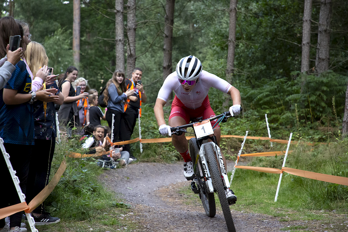 Birmingham 2022 - XXII Commonwealth Games - Mountain Bike - Women - Evie Richards of England races past a home crowd on her way to taking victory