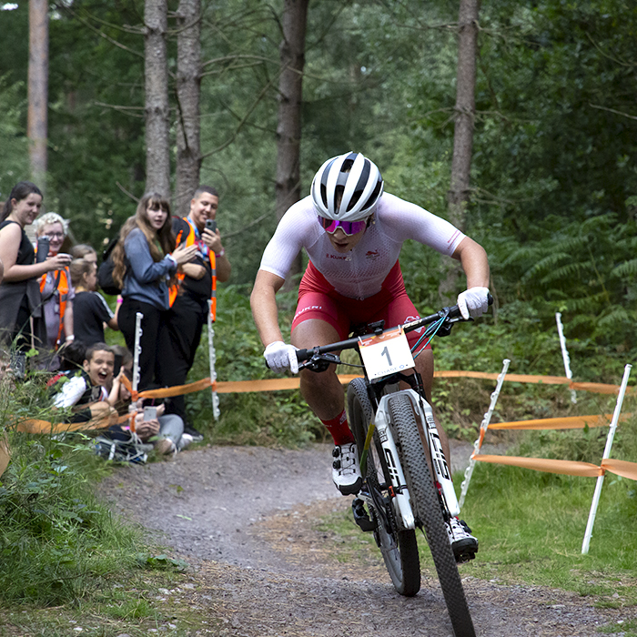 Birmingham 2022 - XXII Commonwealth Games - Mountain Bike - Women - Evie Richards of England races past a home crowd on her way to taking victory