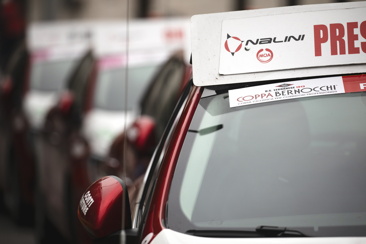 Coppa Bernocchi 2024 - Official Cars line the street prior to the start of the race