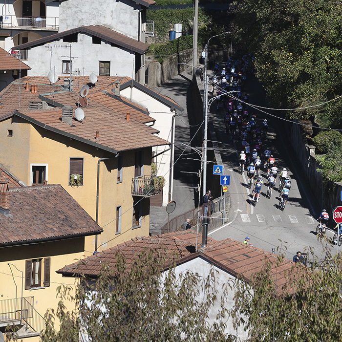 Coppa Bernocchi 2025 - Rooftops and rendered buildings in Castiglione Olona frame the race