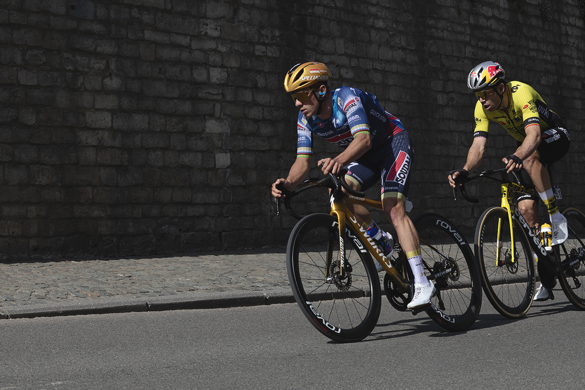 De Brabantse Pijl 2025 - Remco Evenepoel & Wout Van Aert pictured against the church wall in Overijse