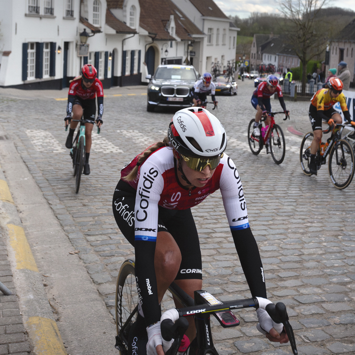 Dwars Door Vlaanderen Vrouwen 2024 - Josie Talbot of Cofidis Women Team races on the cobbles in Nokere