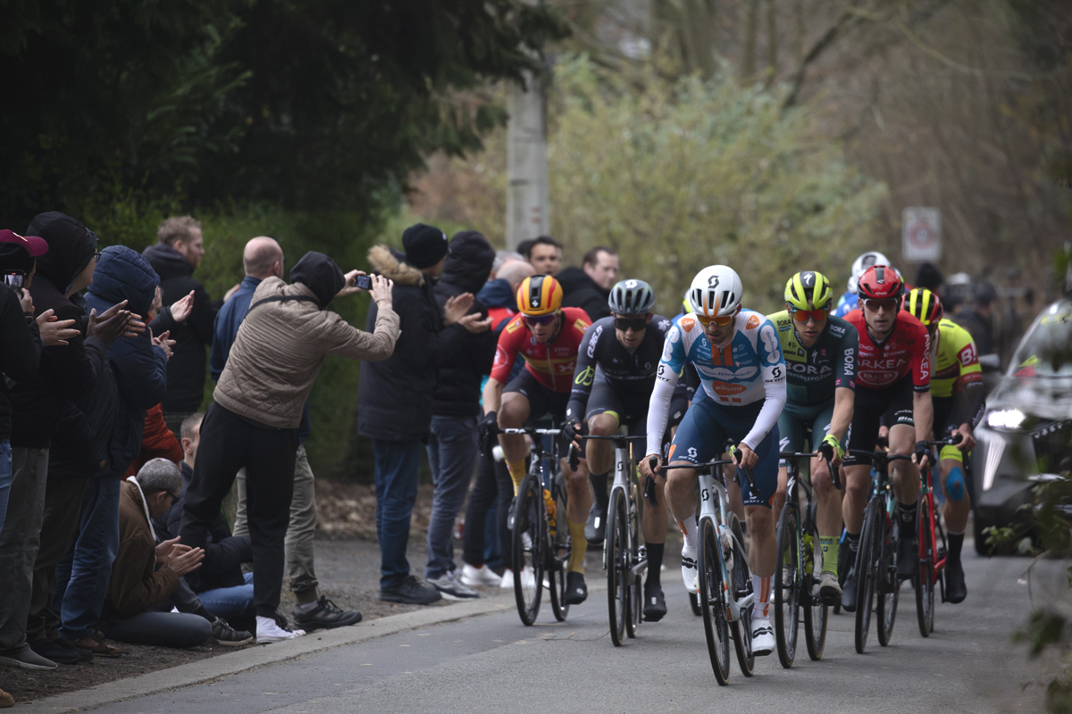E3 Saxo Classic 2024 - Riders in the breakaway make their way up Kanarieberg watched by supporters
