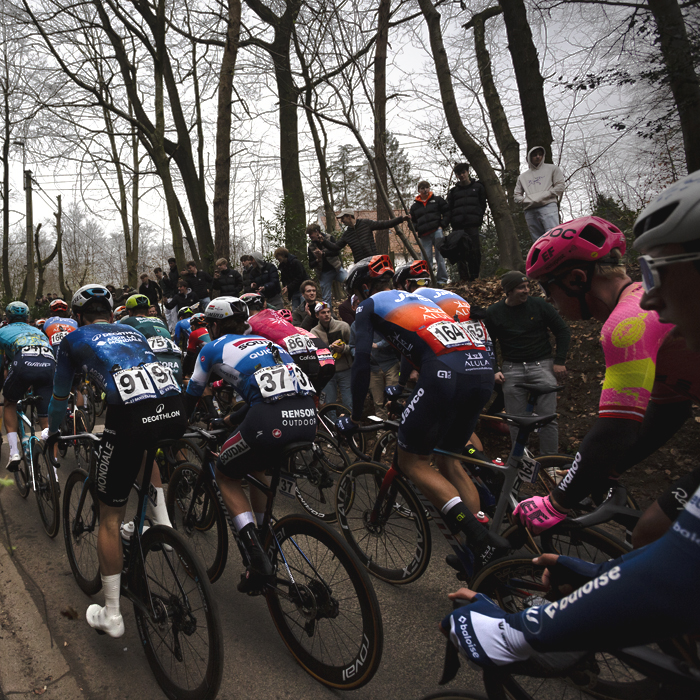 E3 Saxo Classic 2024 - Tree lined banks are dotted with spectators as riders make their way up the climb of Kanarieberg