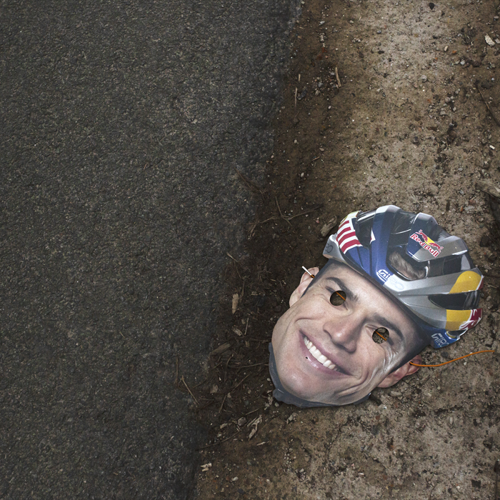E3 Saxo Classic 2024 - A Wout Van Aert mask on the floor at the side of the road