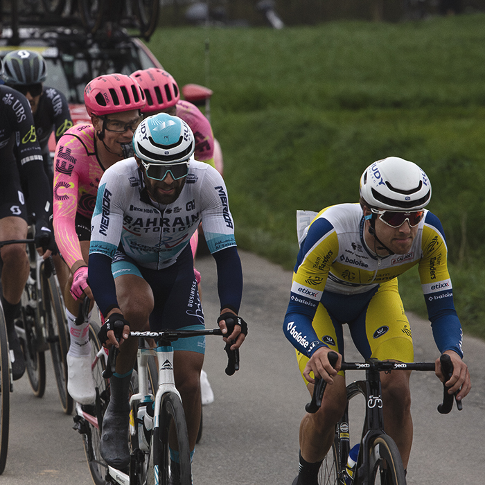 E3 Saxo Classic 2024 - A group of riders races down Langekouter