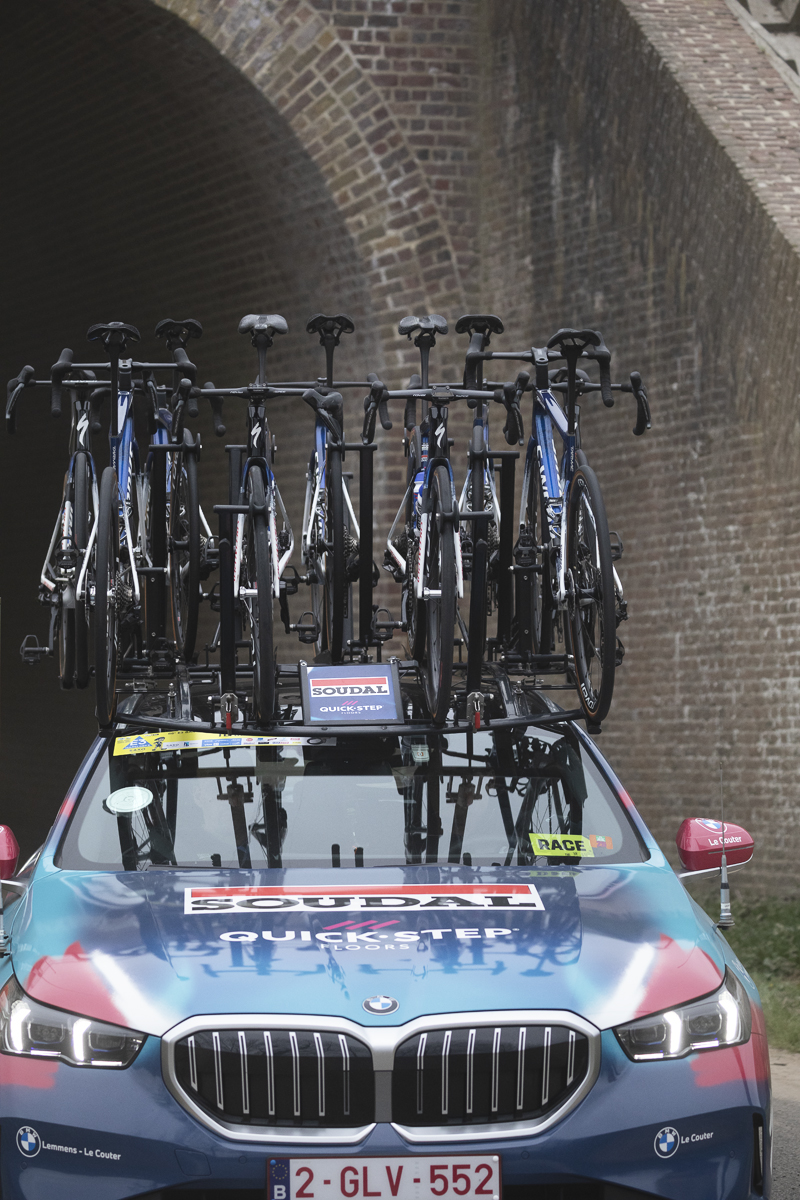 E3 Saxo Classic 2025 - A Soudal Quick-Step race vehicle with spare bikes on its roof
