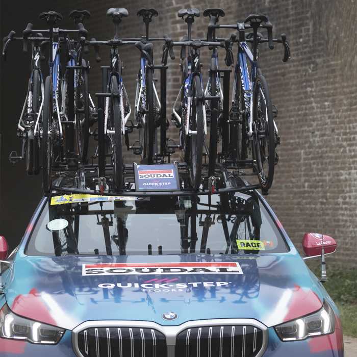 E3 Saxo Classic 2025 - A Soudal Quick-Step race vehicle with spare bikes on its roof