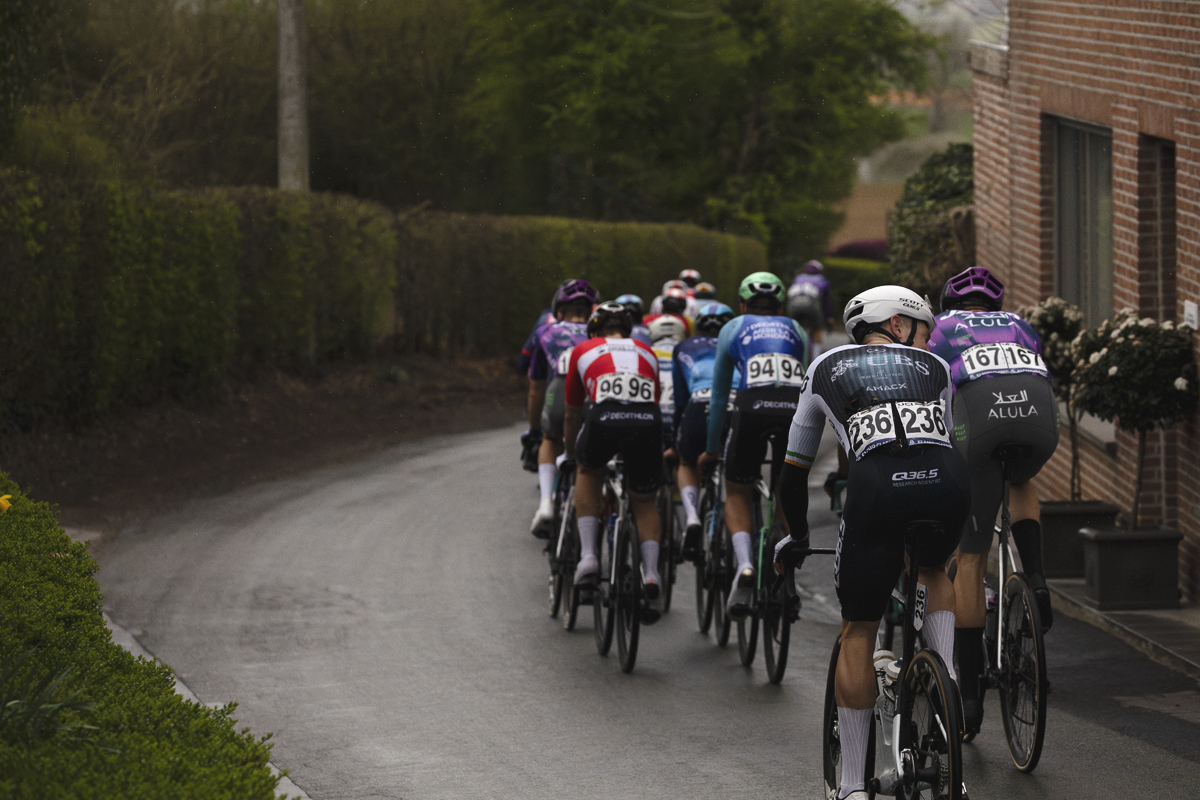 E3 Saxo Classic 2025 - Riders begin a descent as they make their way off Tiegemberg