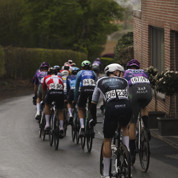 E3 Saxo Classic 2025 - Riders begin a descent as they make their way off Tiegemberg