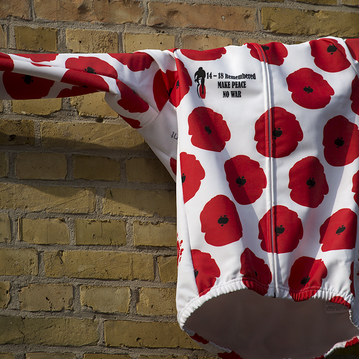 Gent Wevelgem 2019 - A jersey covered in poppies commemorating WWI hangs from a wall in Ieper / Ypres.