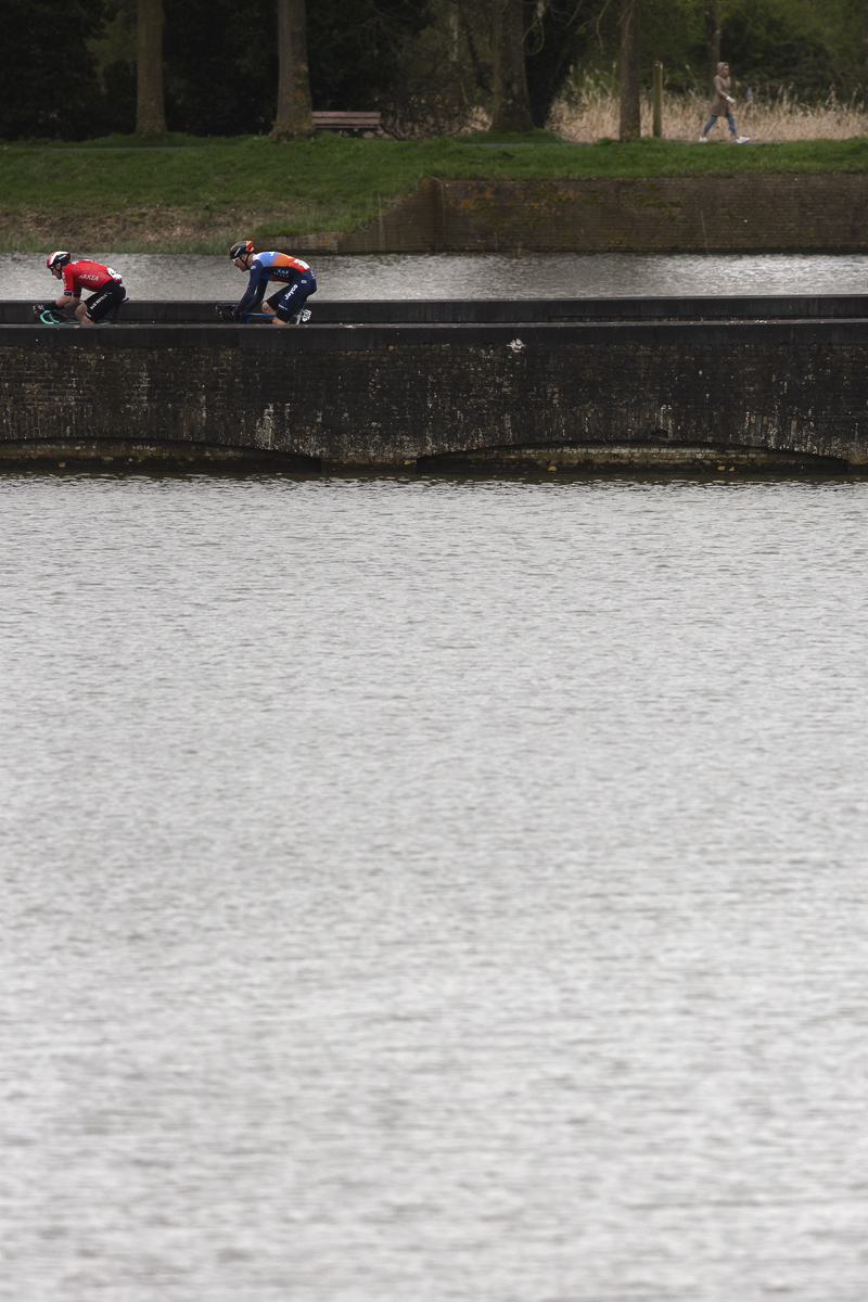 Gent Wevelgem 2024 - Arnaud Démare and Max Walscheid seen across the water