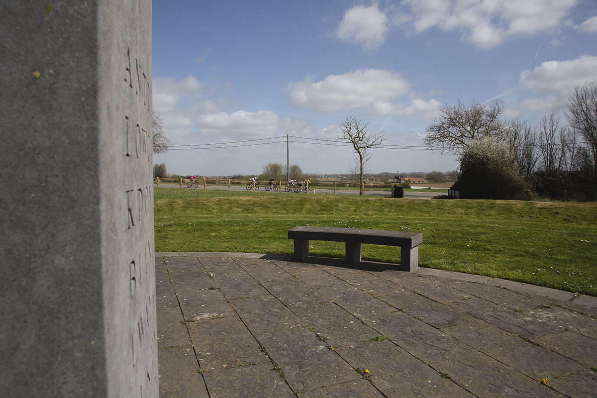Gent Wevelgem 2025 - A group of riders viewed from the Iers Vredespark
