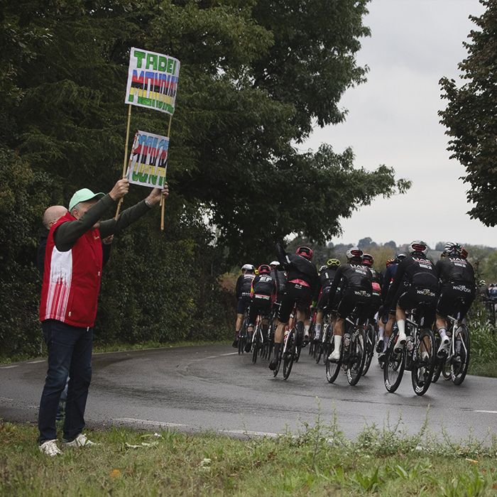 Giro dell’Emilia 2024 - A fan holds up a sign showing support for Tadej Pogačar in Castelvetro