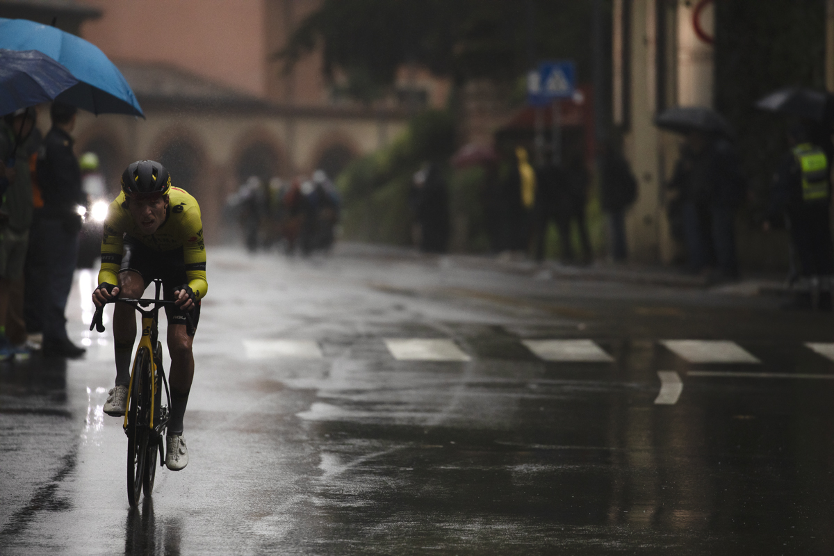 Giro dell’Emilia 2024 - Johannnes Staune Mittet of Team Visma - Lease a Bike is chased down by a larger group