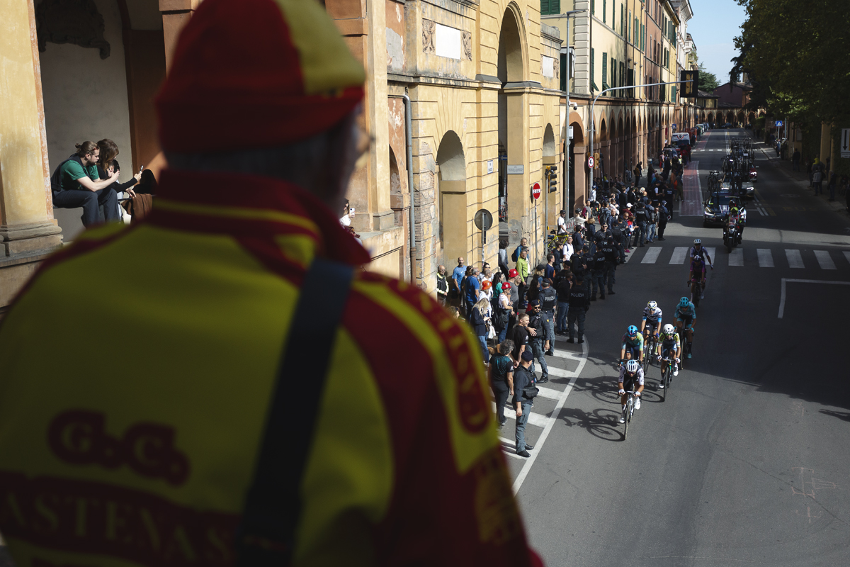 Giro dell’Emilia 2025 - An elderly fan dressed in his racing club colours watched the riders from his vantage point on the Arco del Meloncello