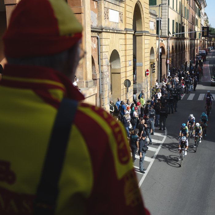 Giro dell’Emilia 2025 - An elderly fan dressed in his racing club colours watched the riders from his vantage point on the Arco del Meloncello
