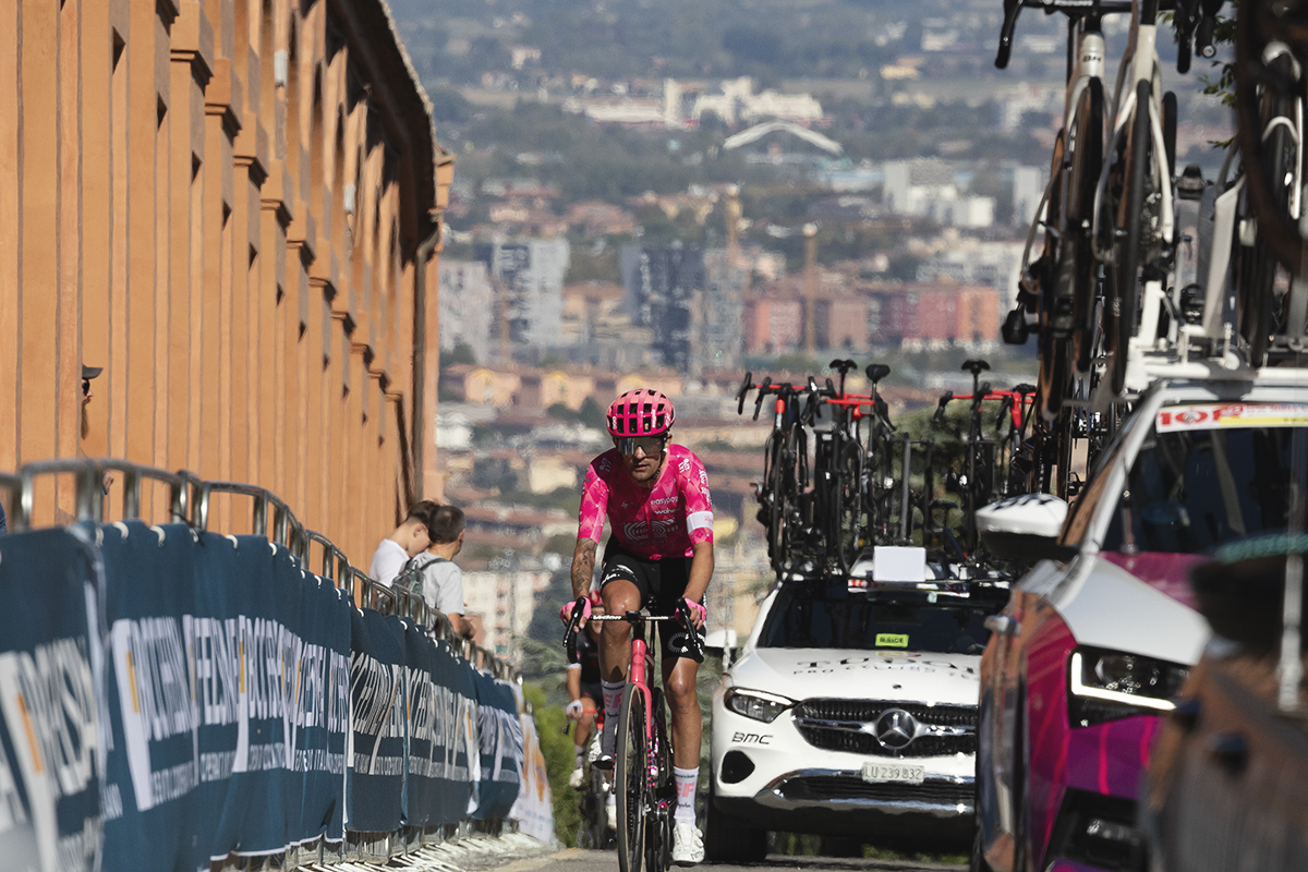 Giro dell’Emilia 2025 - James Shaw in the convoy of cars on the San Luca climb