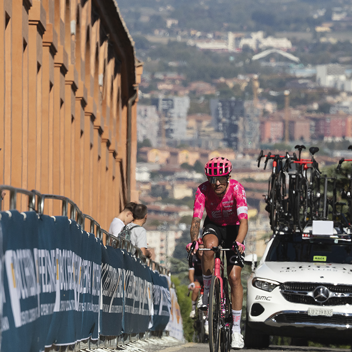 Giro dell’Emilia 2025 - James Shaw in the convoy of cars on the San Luca climb
