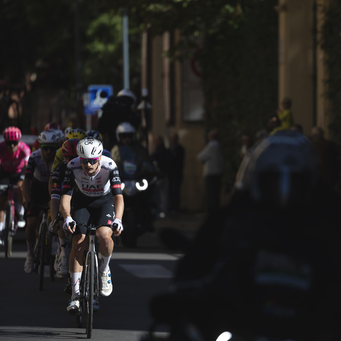 Giro dell’Emilia 2025 - Jay Vine leads a group of riders