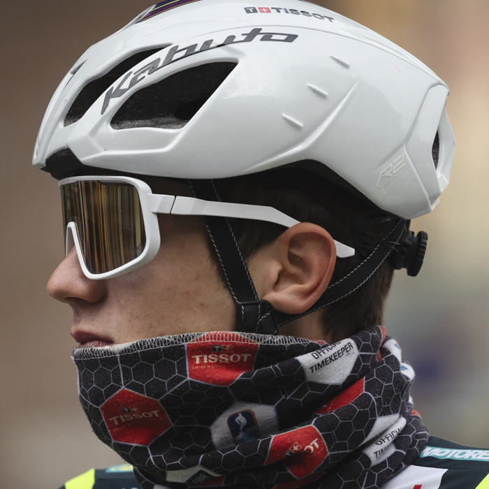 Giro dell’Emilia 2025 - Alexandre Balmer pulls up his snood against the cold at the race start