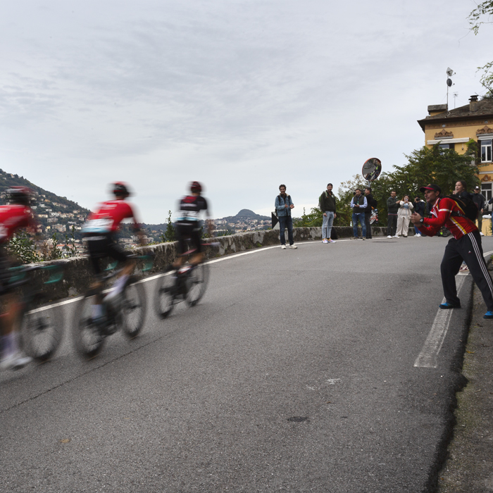 Il Lombardia 2024 - Riders are encouraged by a fan in Como