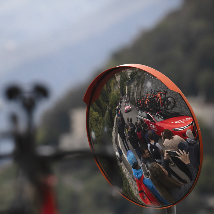 Il Lombardia 2024 - INEOS Grenadiers team car reflected in a mirror