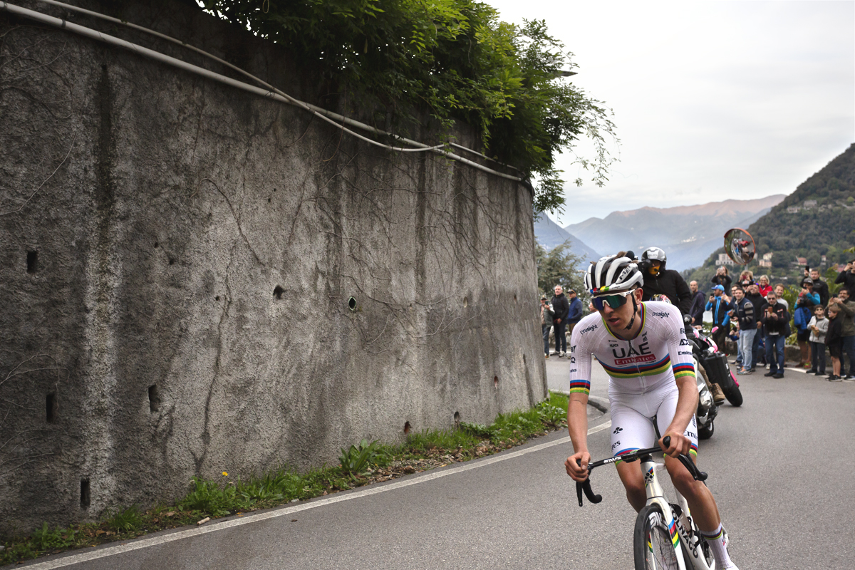 Il Lombardia 2024 - Tadej Pogačar climbs towards San Fermo della Battaglia with Lake Como in the background
