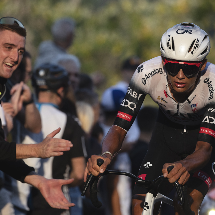 Il Lombardia 2025 - Isaac del Toro lie by late afternoon sun is applauded for his efforts by fans at the roadside