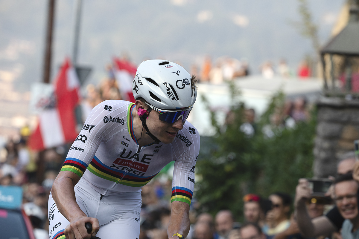 Il Lombardia 2025 - Tadej Pogačar smiles slightly as he rounds a corner on the climb