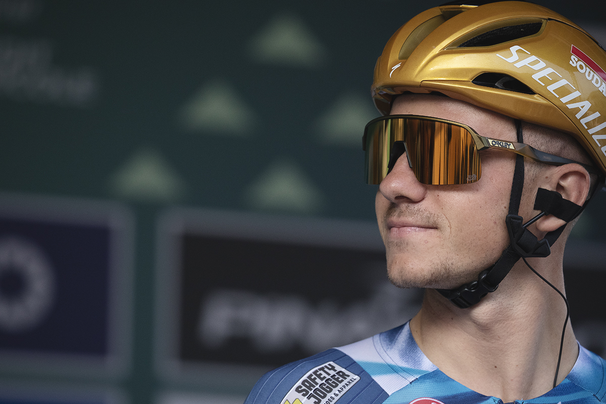 Il Lombardia 2025 - Remco Evenepoel wearing his Olympic Champions’ golden helmet on the podium at the beginning of the race