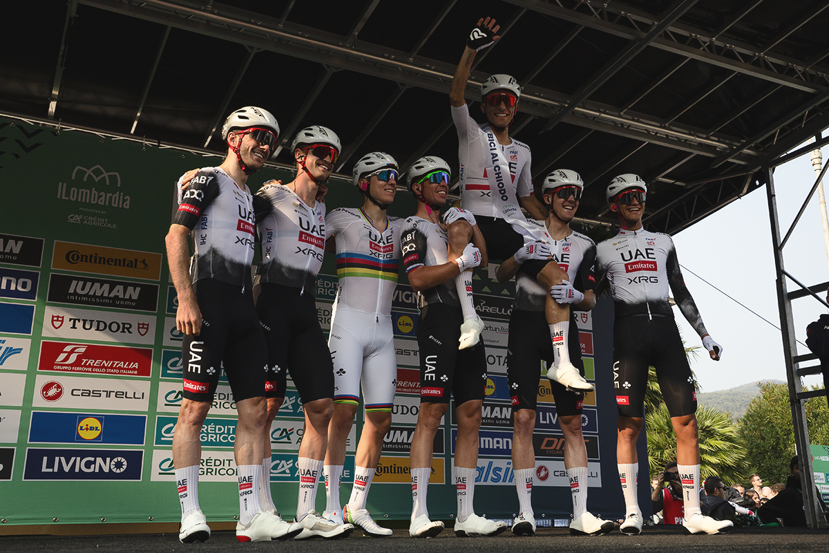 Il Lombardia 2025 - UAE Team Emirates - XRG hold their teammate Rafał Majka aloft as he is presented to the crowd for the last time in his career