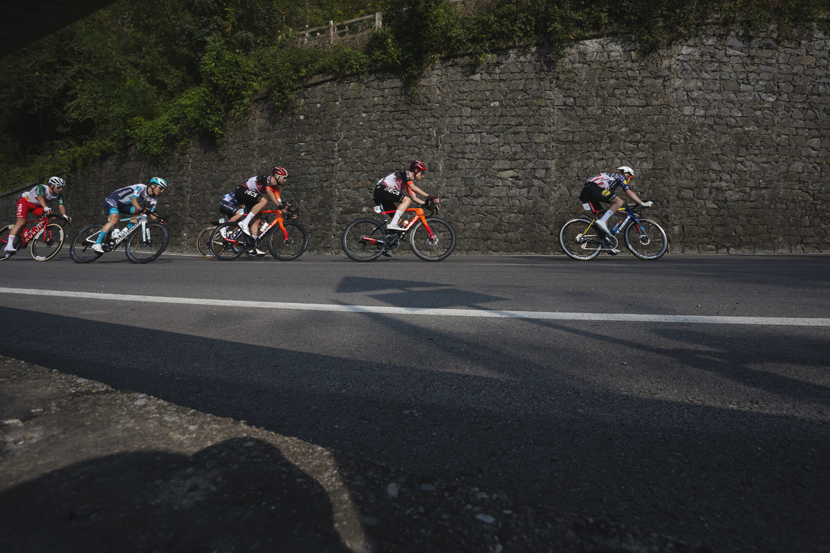 Il Lombardia 2025 - Riders race along the road in Ponti
