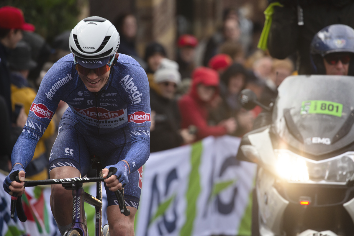 La Flèche Wallonne 2024 - Søren Kragh Andersen of Alpecin - Deceuninck is followed by a motorbike on the Mur de Huy