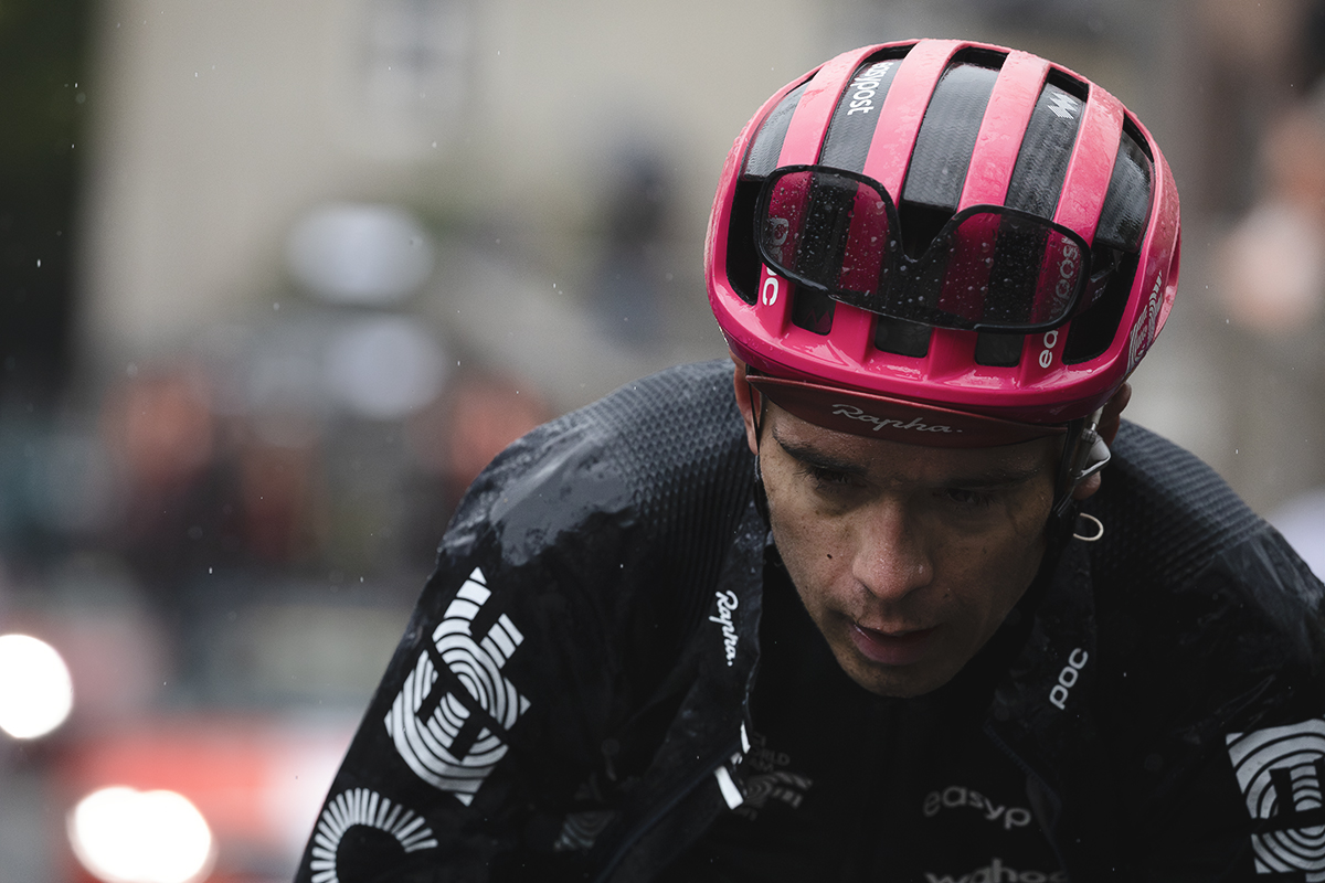 La Flèche Wallonne 2025 - Alex Baudin looks downwards as the rain falls on the Mur de Huy